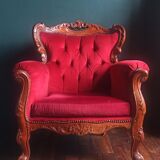 Baroque style carved wooden armchair in burgundy red velvet