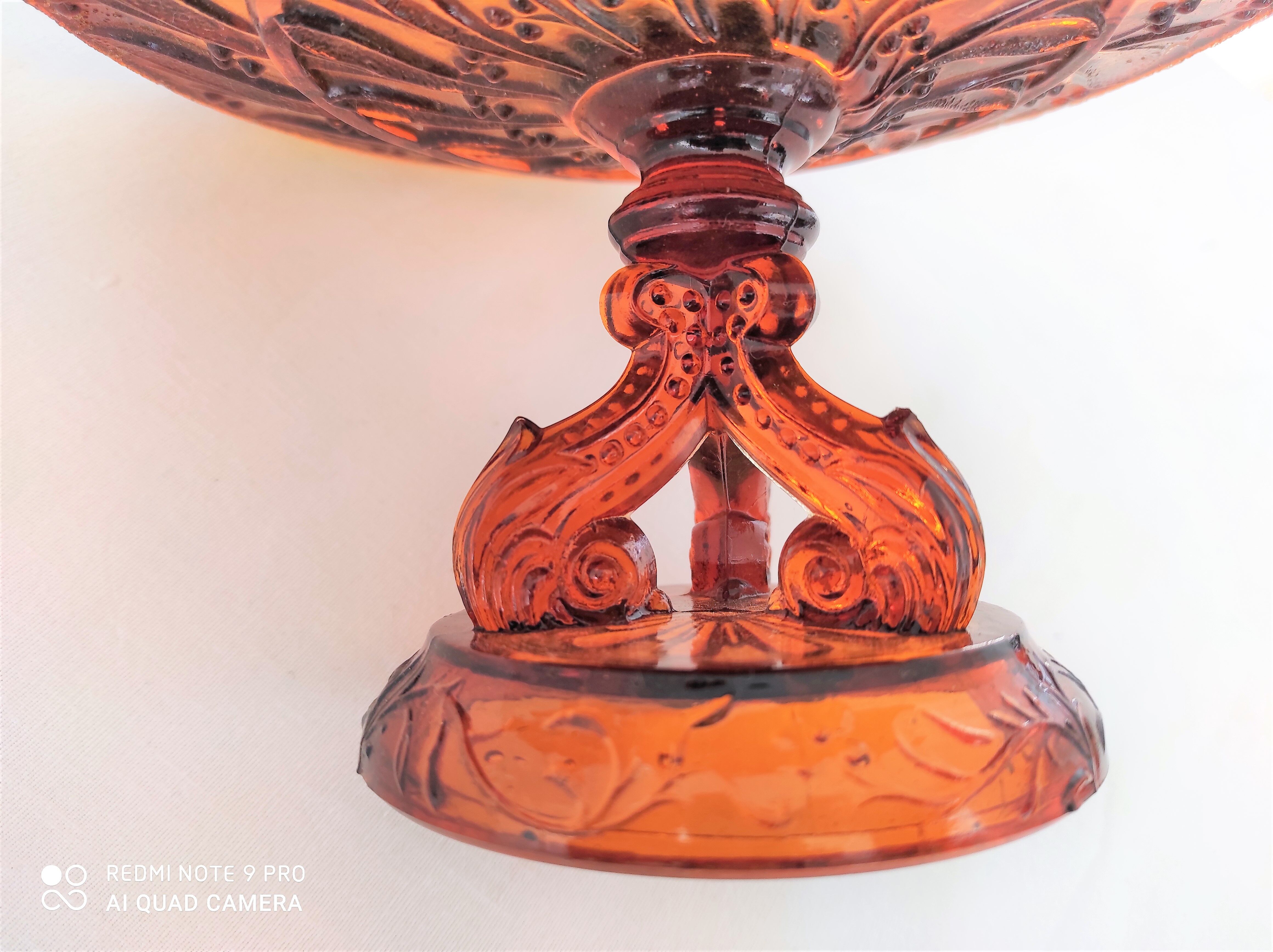 Amber moulded glass compotier on tripod pedestal around 1900/1930