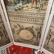 Four-panel screen from the Louis XVI period with rustic decorations.