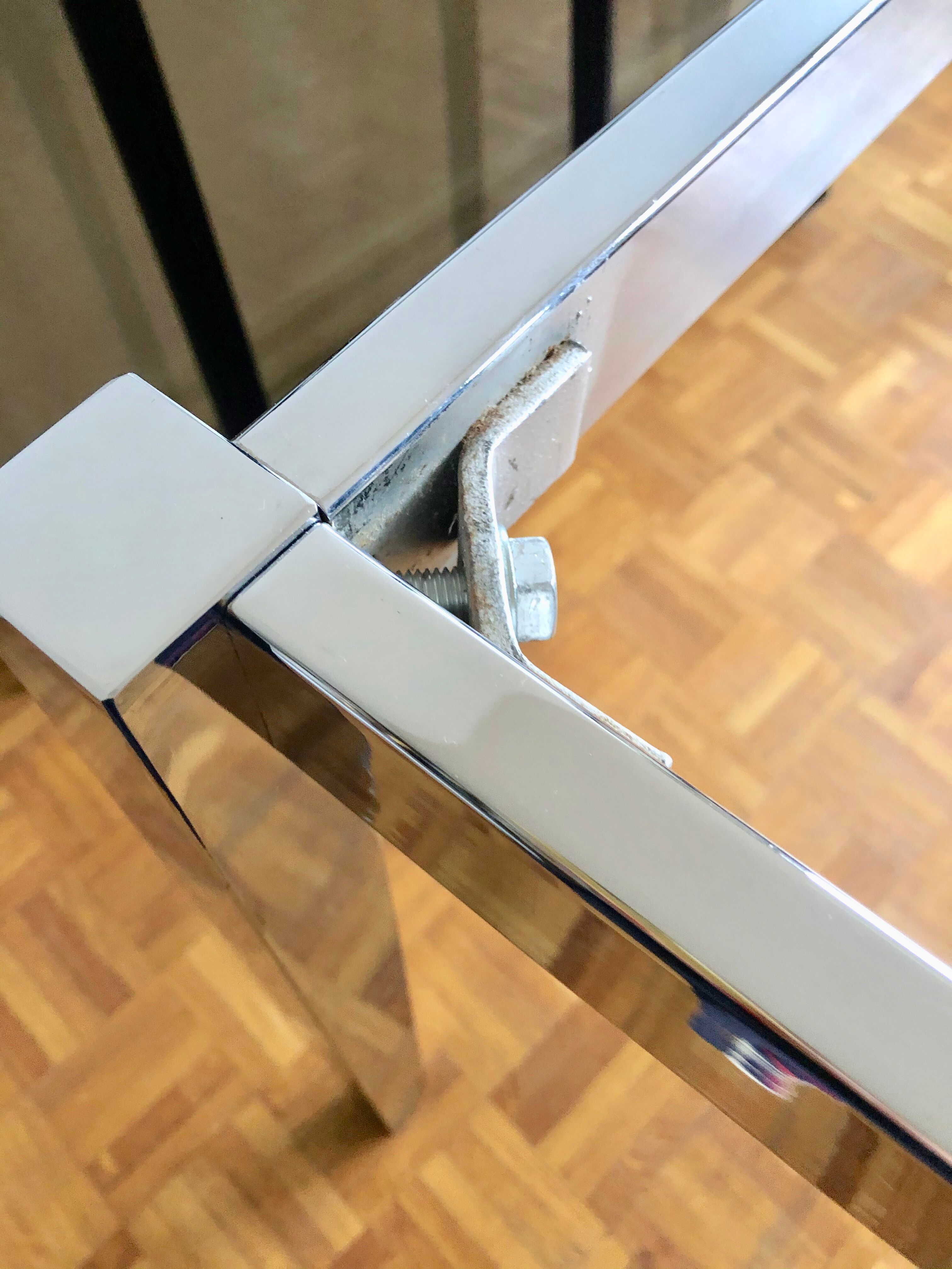 Glass and chrome metal dining table