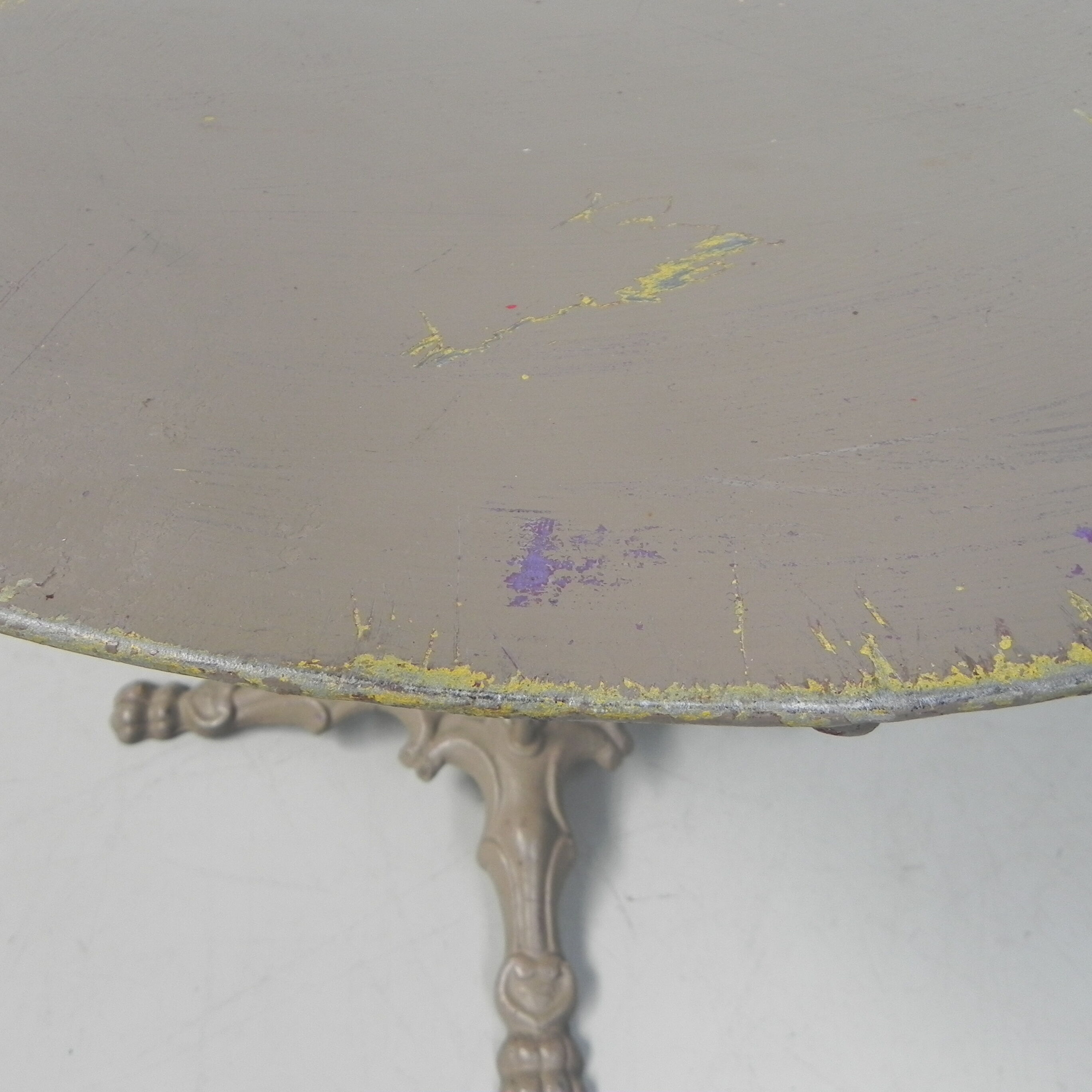 Steel garden table on cast iron base