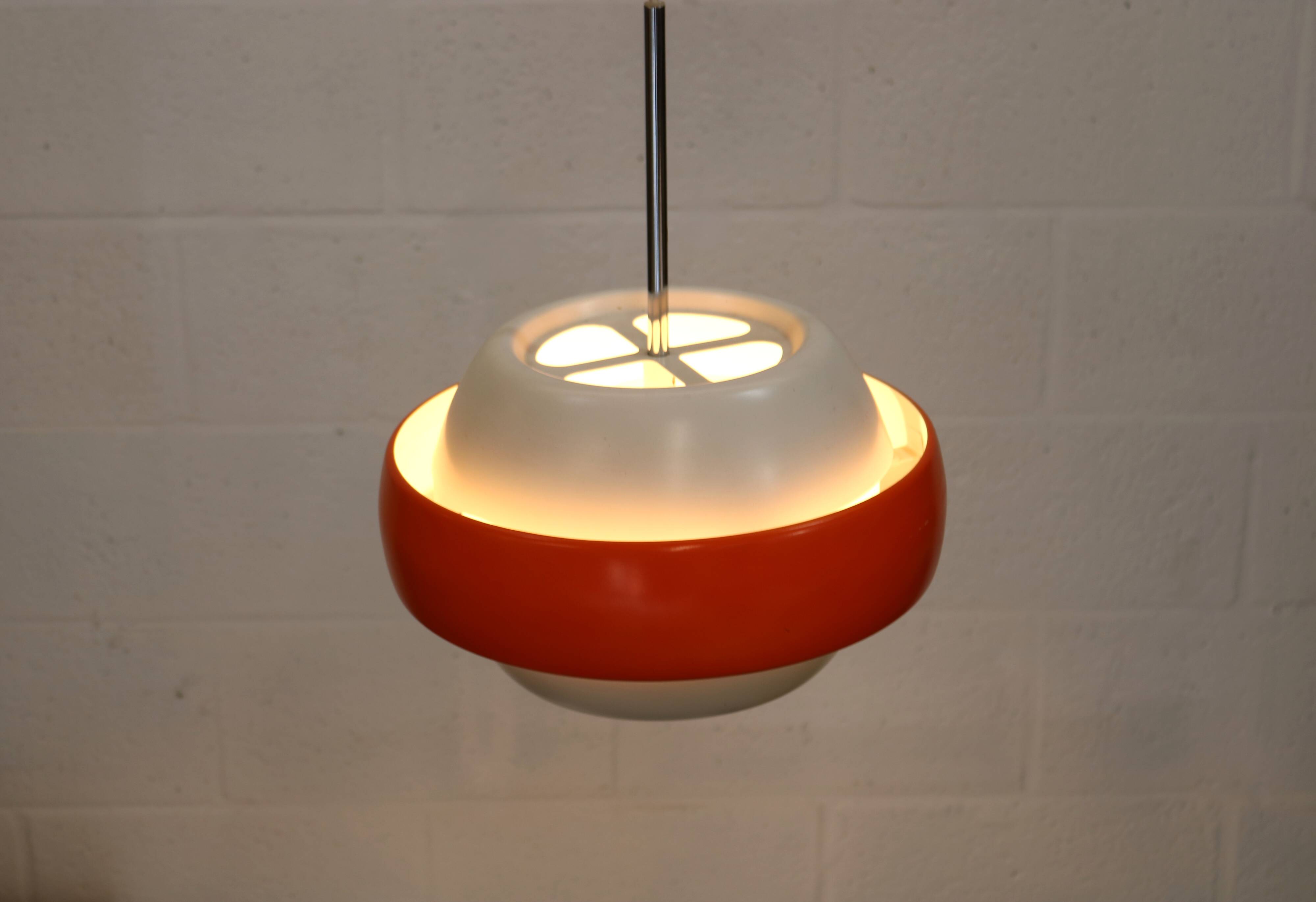 orange and white vintage lamp with chrome accent