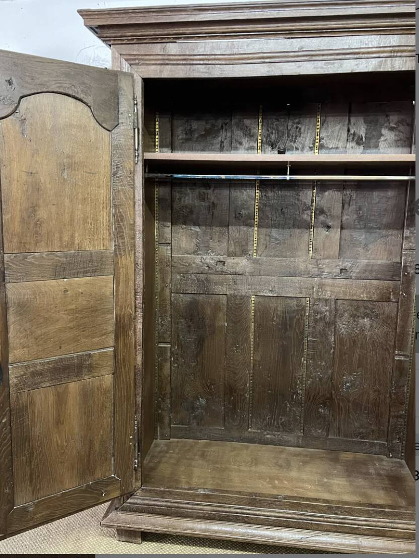 Louis XV carved wooden wardrobe from the 18th century