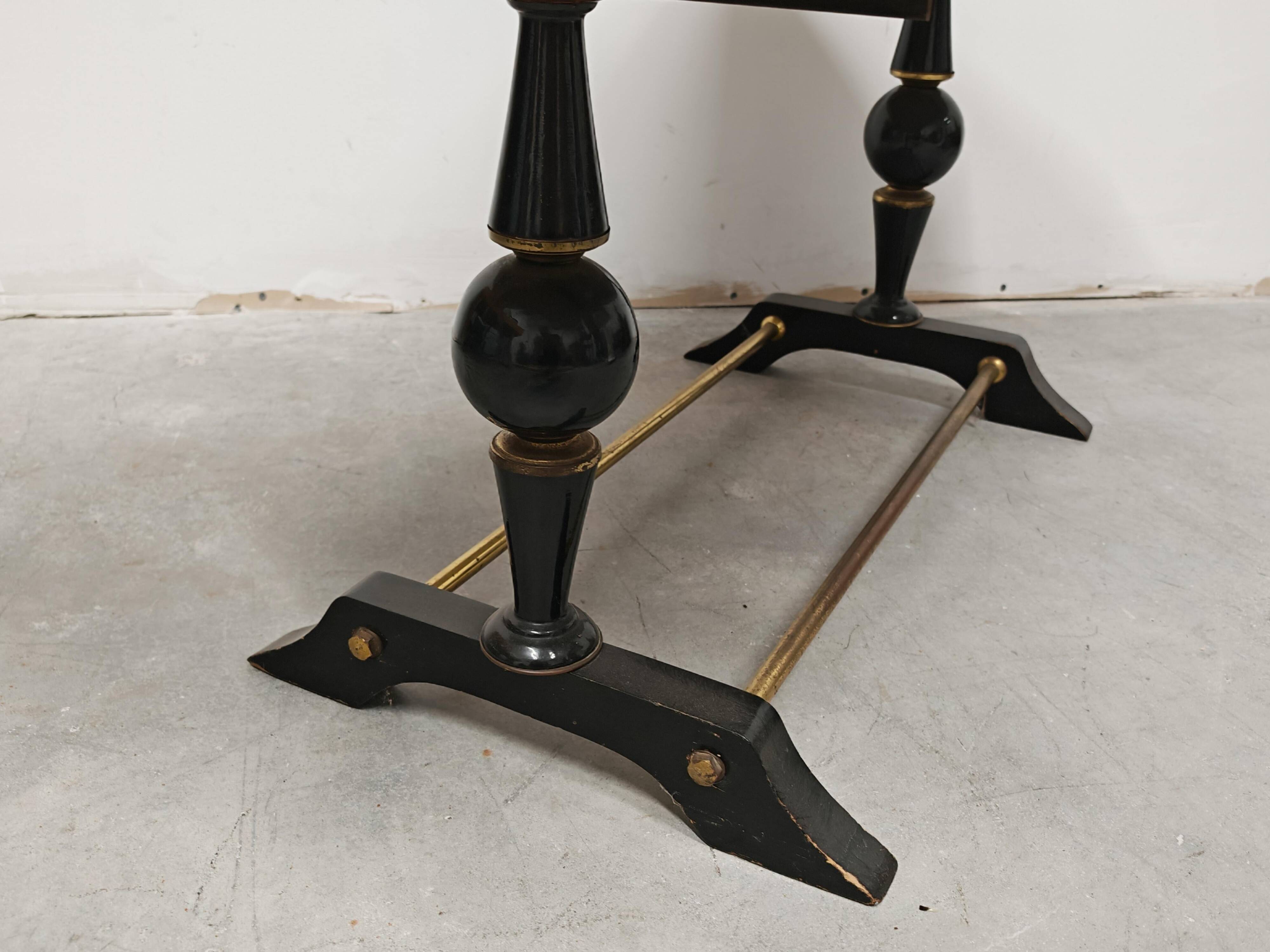 Mid-century modern coffee table in marble, brass, and wood, 1950s.
