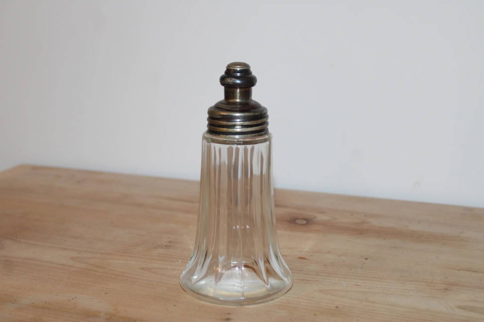 Vintage striped glass and patinated metal oil serving utensil.