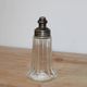 Vintage striped glass and patinated metal oil serving utensil.