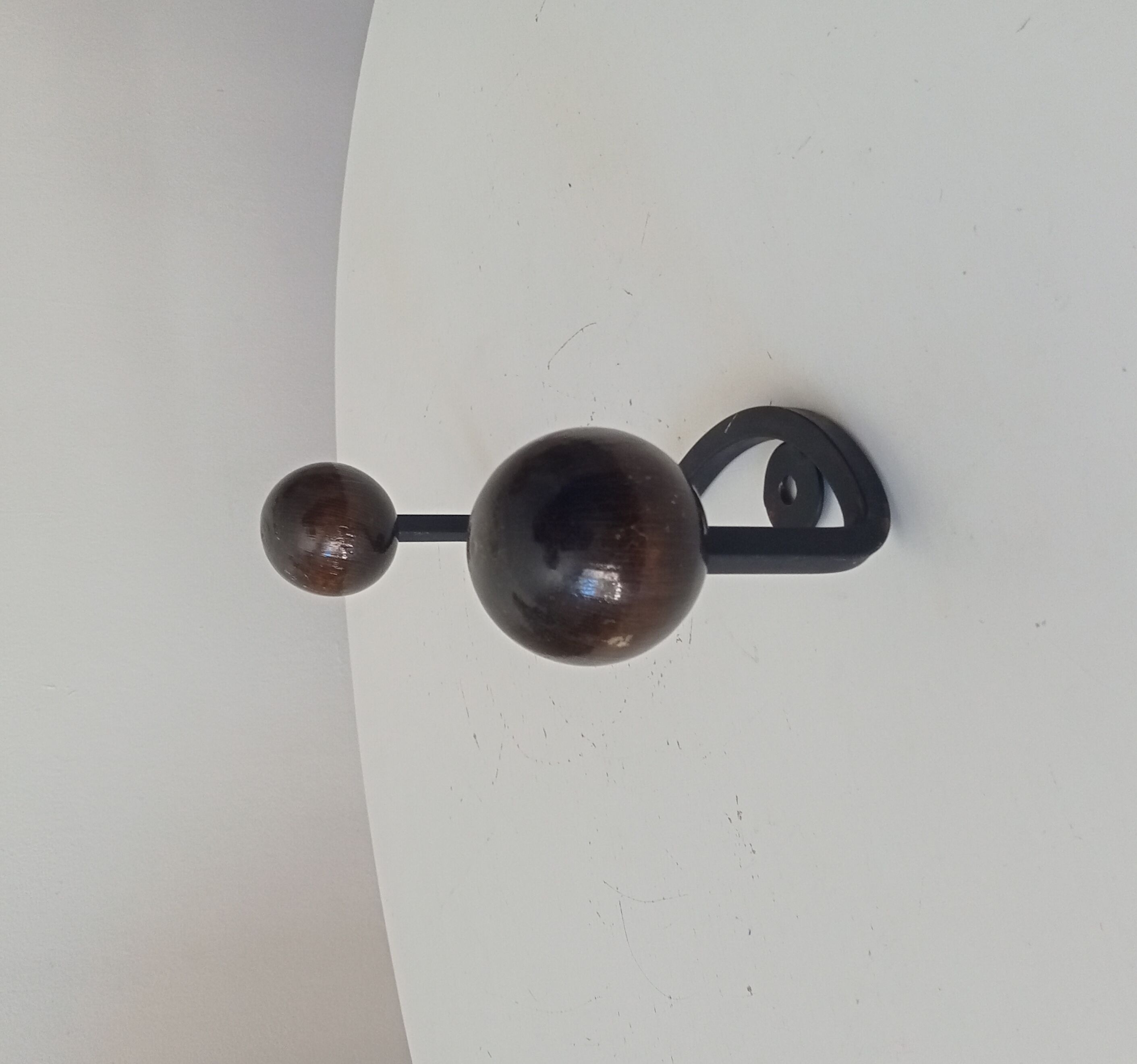 Wood and wrought iron ball coat rack from the 1950s.