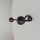 Wood and wrought iron ball coat rack from the 1950s.