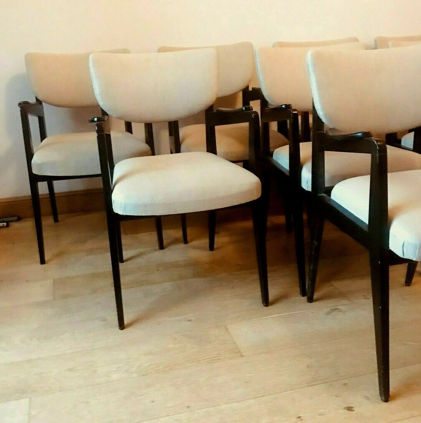 Suite of eight design chairs from the 60s in 10th century blackened wood