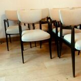 Suite of eight design chairs from the 60s in 10th century blackened wood