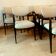 Suite of eight design chairs from the 60s in 10th century blackened wood