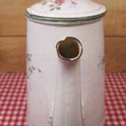 Old coffee maker in enamelled sheet metal brand bb 1900s , decoration of roses , kitchen utensils