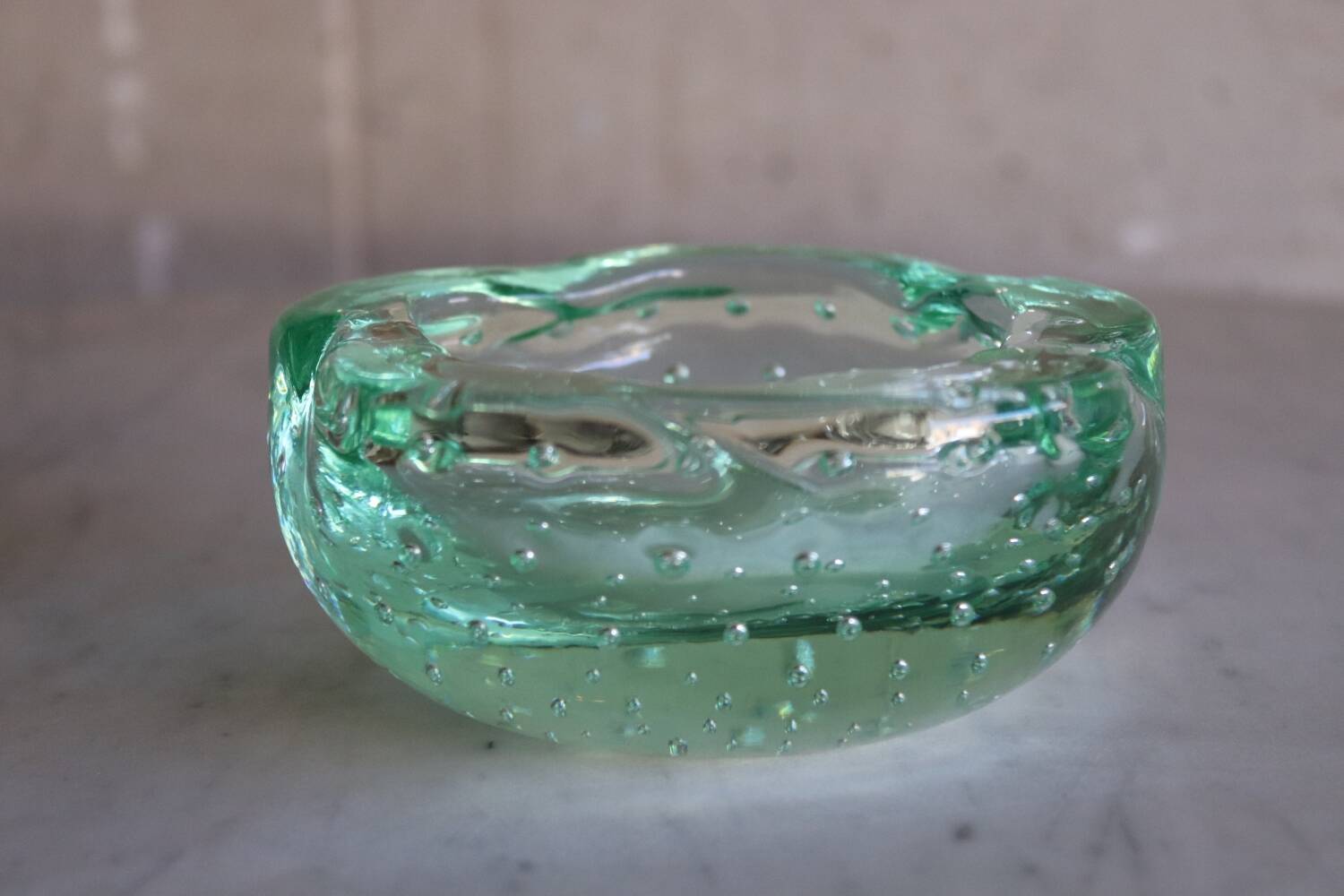 Daum green ashtray or empty pocket in bubbled glass