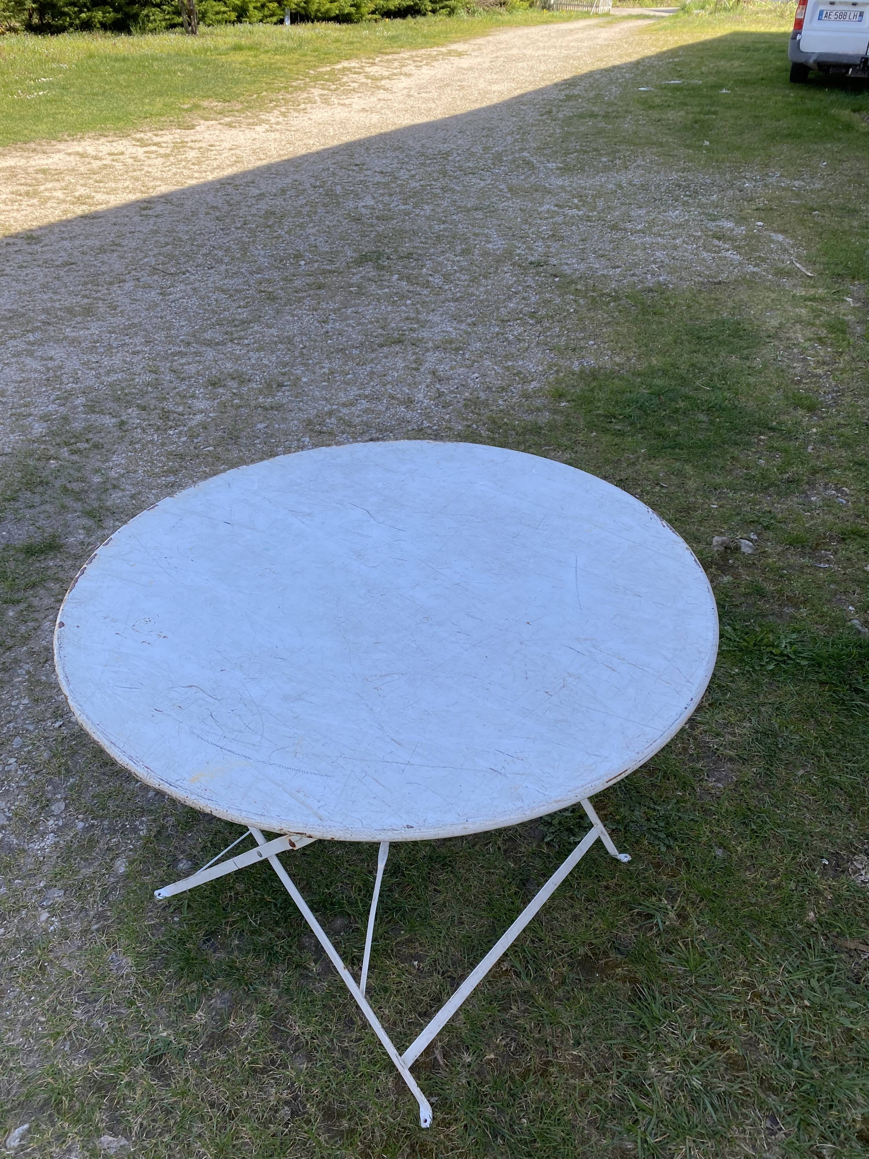Round folding metal table – circa 1950