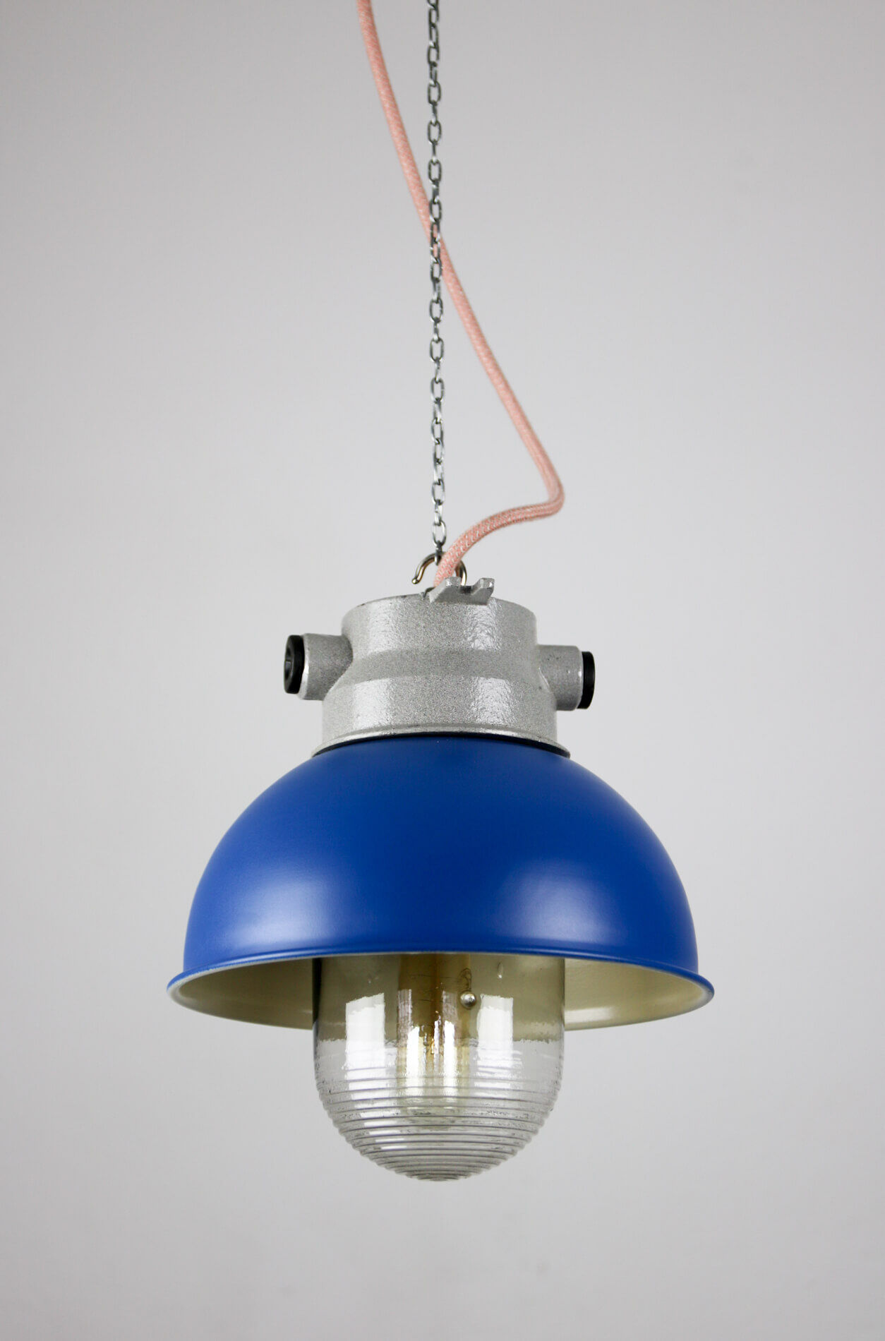 Blue industrial hanging light from tep