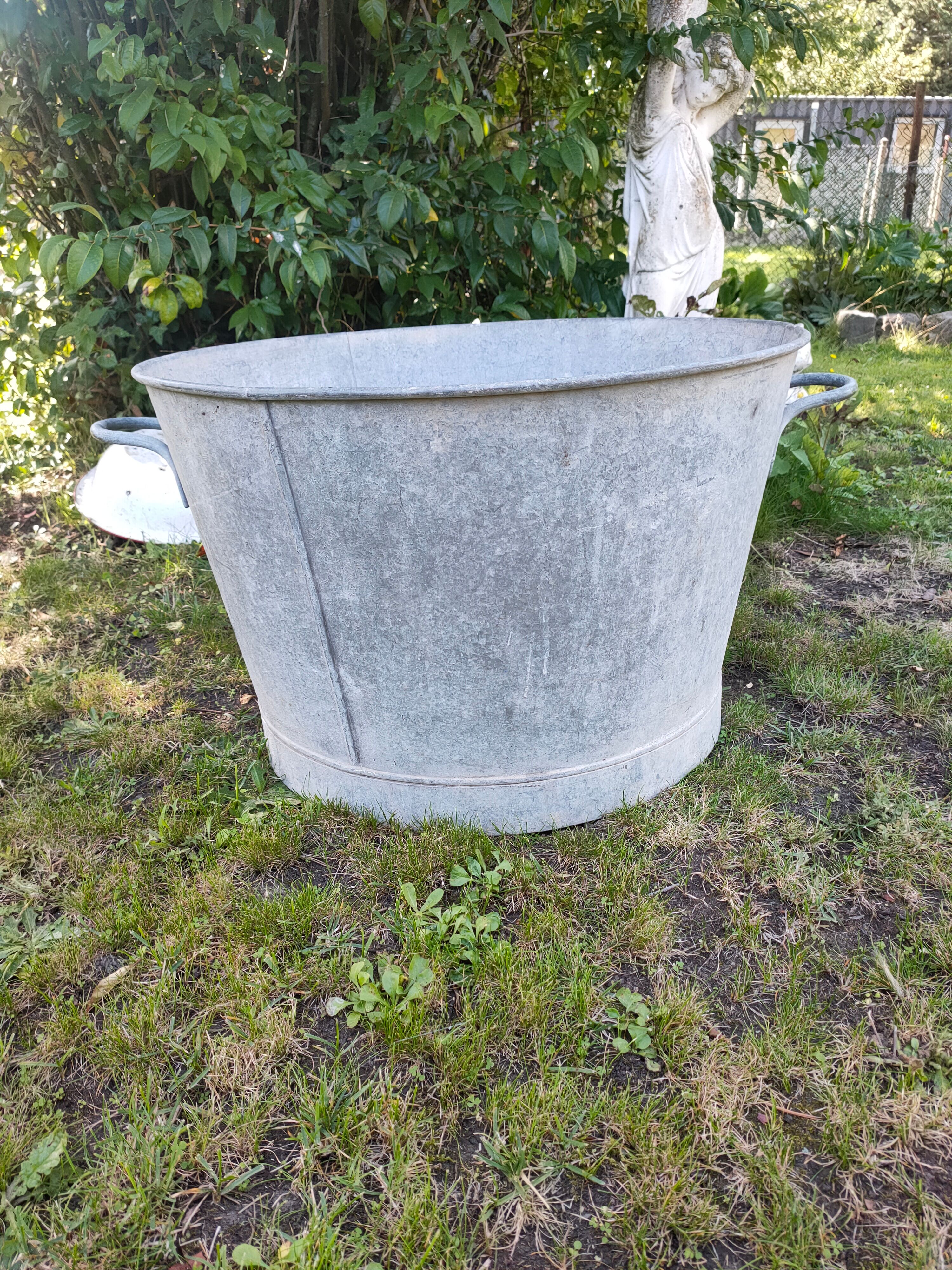 Old round zinc basin