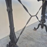 Antique cast iron and marble bistro restaurant table