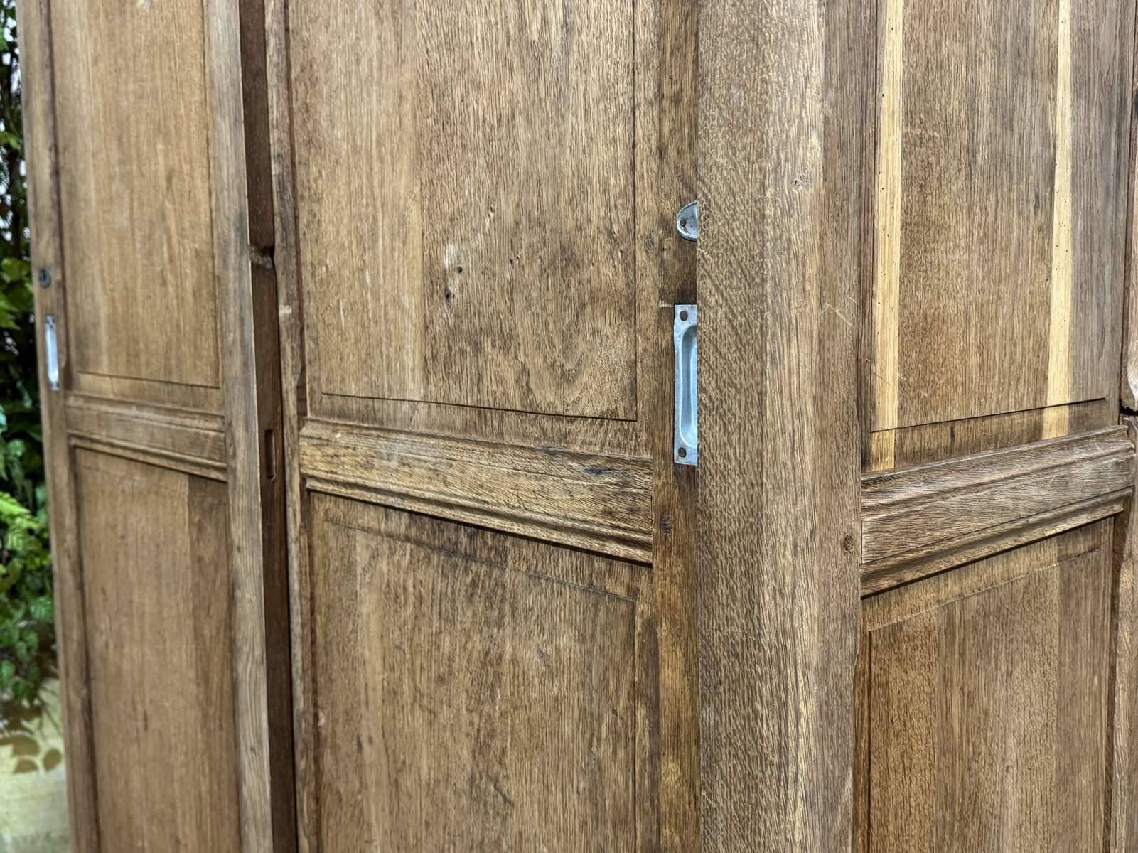 Oak wardrobe with sliding doors from the 1930s.