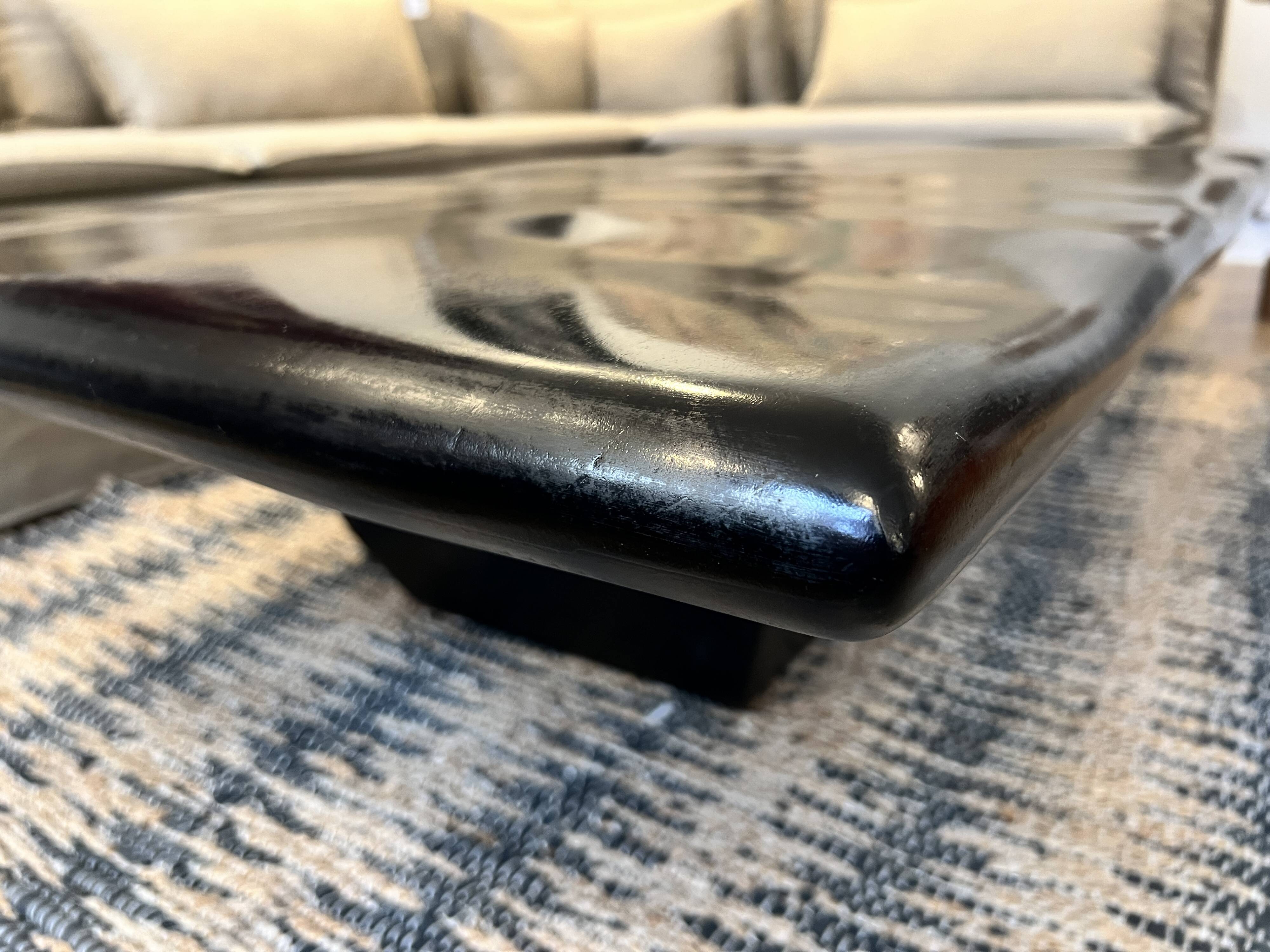 Mango wood coffee table, "wave effect" top.