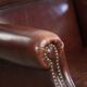 Vintage sheepskin wingback armchair with a timeless English look