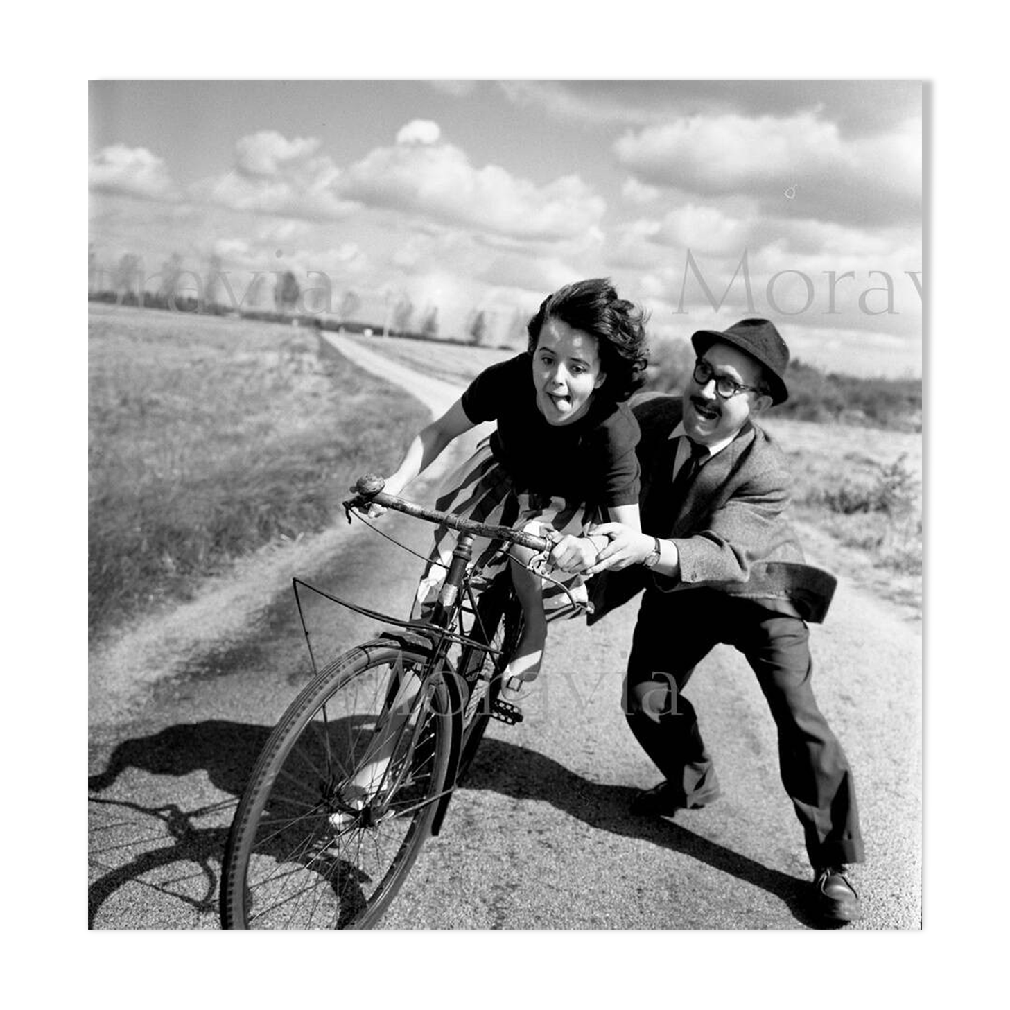 Photograph, “The young girl with a bicycle”, 1959 / Homage to Robert Doisneau