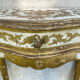 Pairs of Florentine bedside tables in gilded wood.