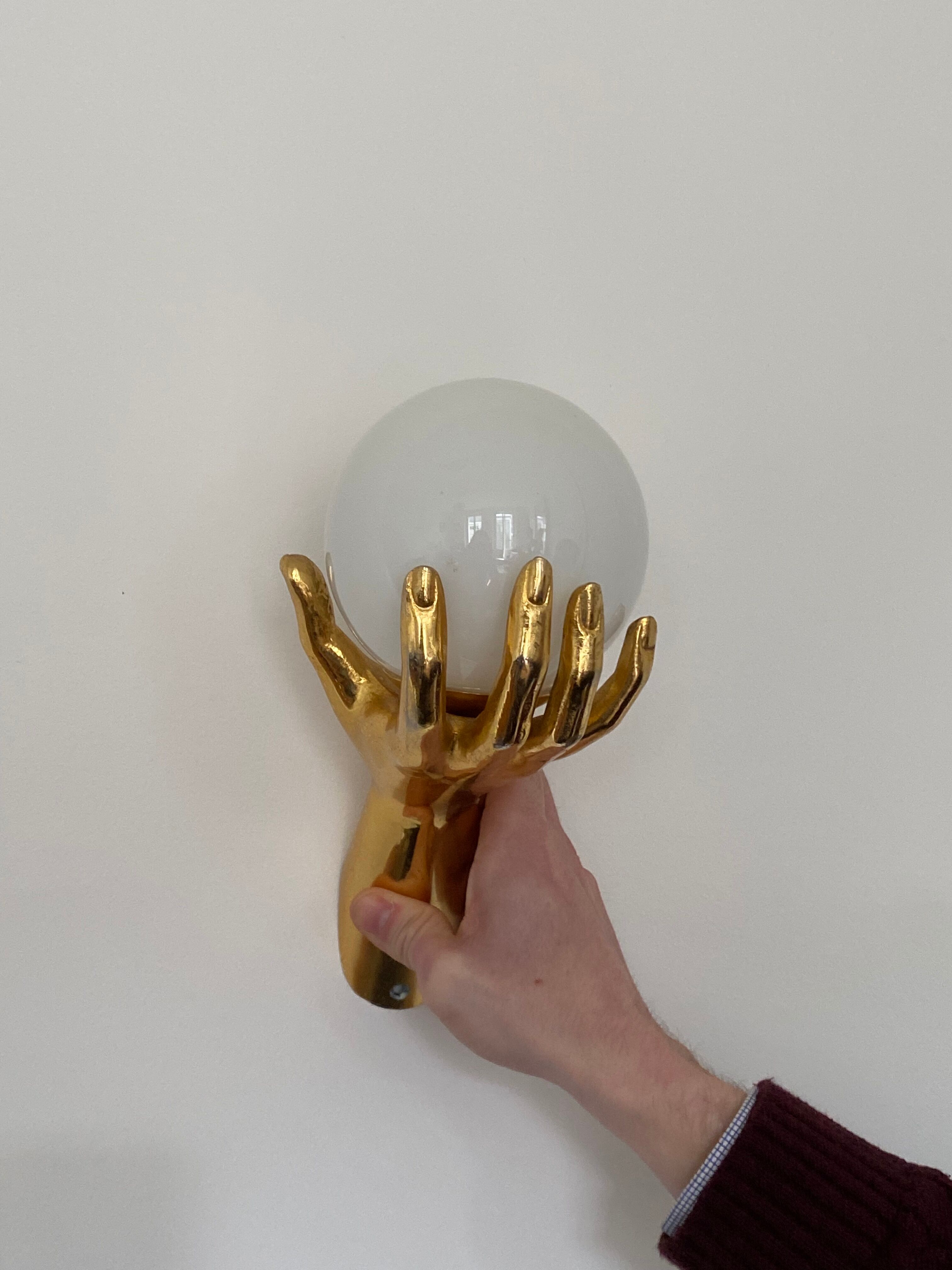 Pair of Arlus hand sconces