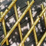 Wall coat rack in gilded metal