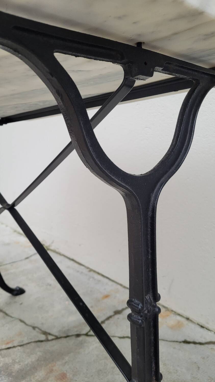 Marble and cast iron restaurant bistro table