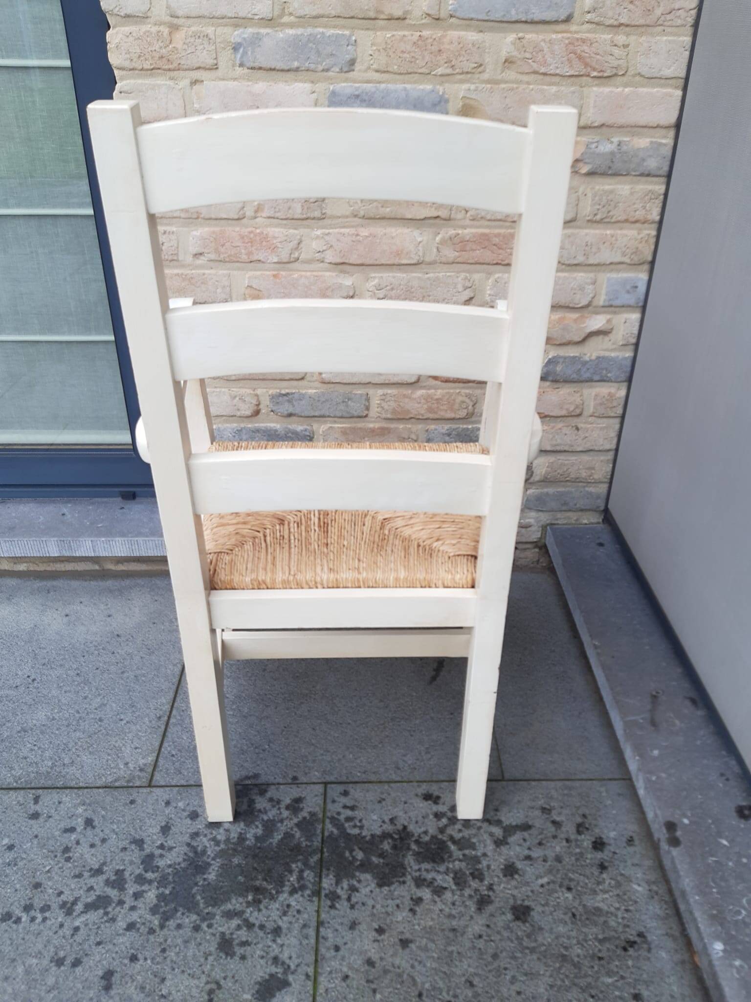 2 armchairs by the fireplace