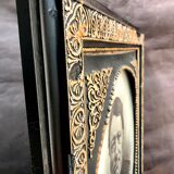 Black and gilded ebonite frame, wood and plaster 19th century
