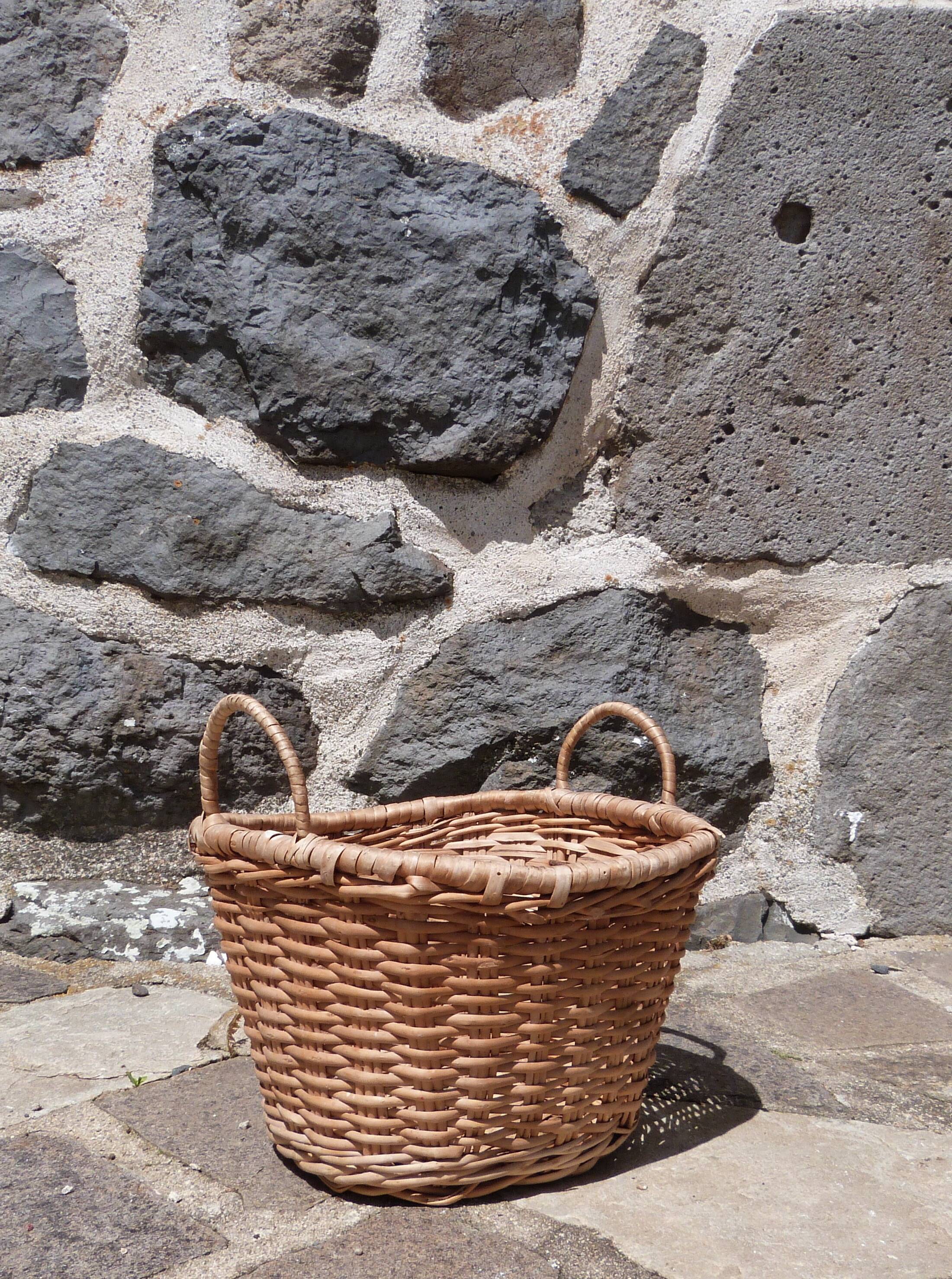 Small wicker basket with handles