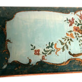 Venetian-style wooden lace-up with bouquets of flowers