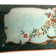 Venetian-style wooden lace-up with bouquets of flowers