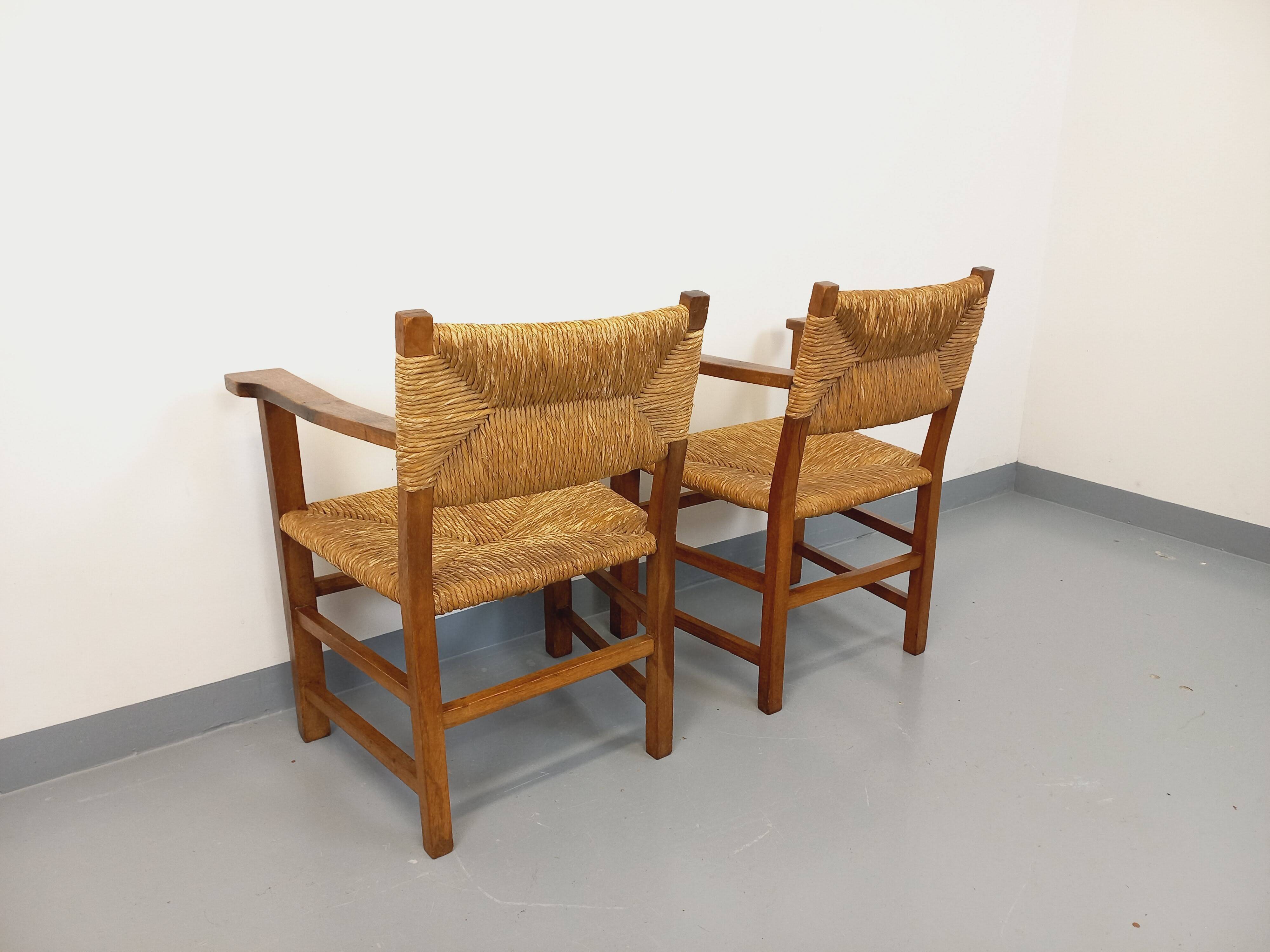 Set of 2 vintage brutalist armchairs in oak wood and straw