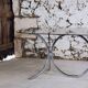 Chrome and smoked glass dining table in the style of Gastone Rinaldi, 1970.