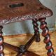 Antique stool in turned and carved solid wood