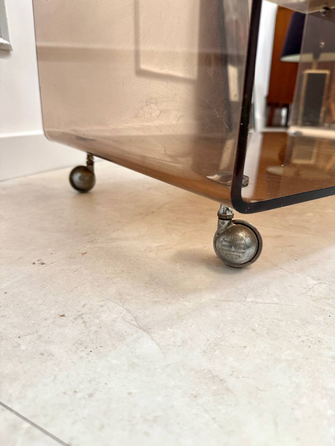 Smoked plexiglass coffee table