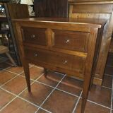 Louis XVI style commode in solid cherry wood.