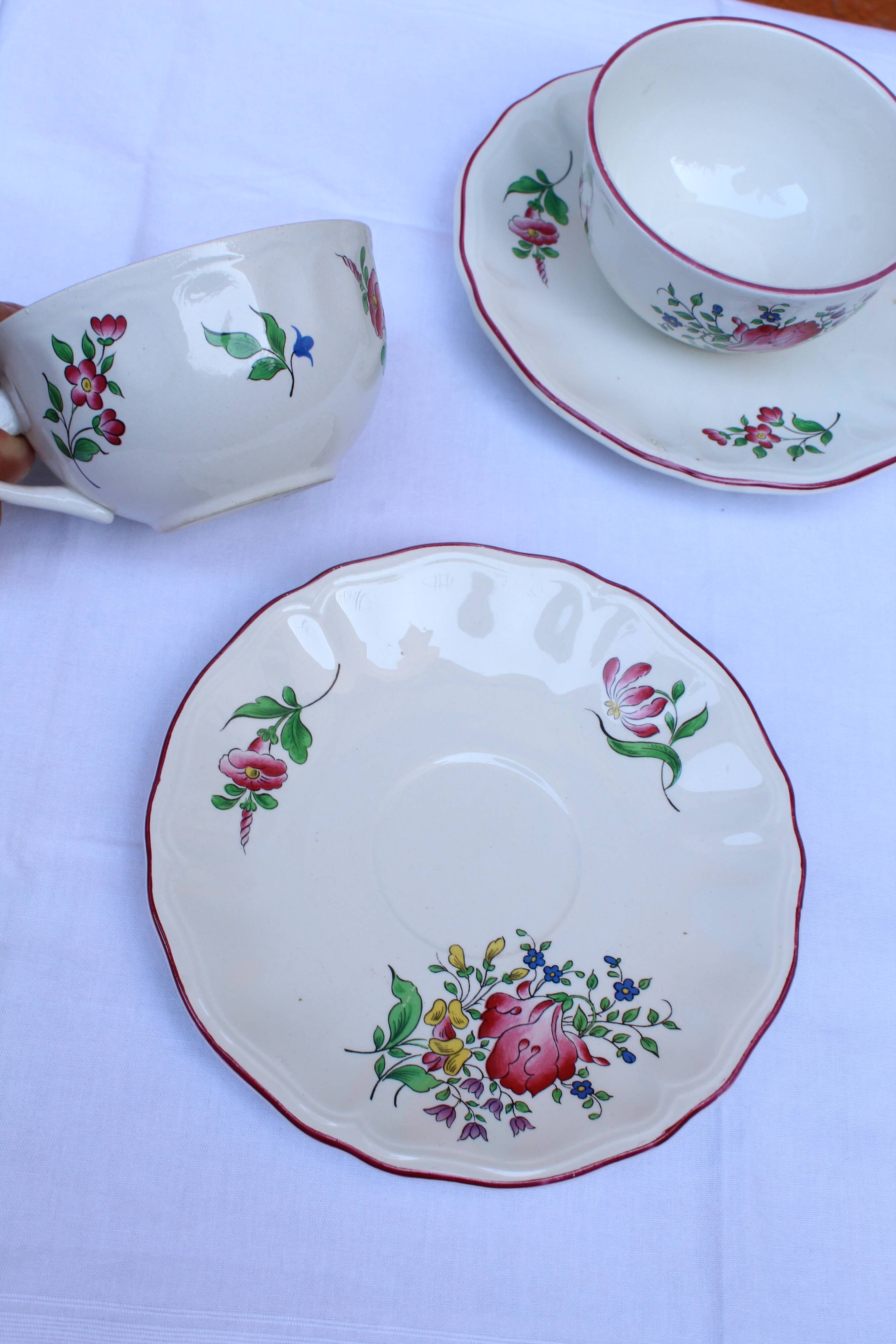 Lunéville earthenware cups and saucers