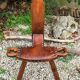 Chaise vintage tripode en bois et cuir années 60