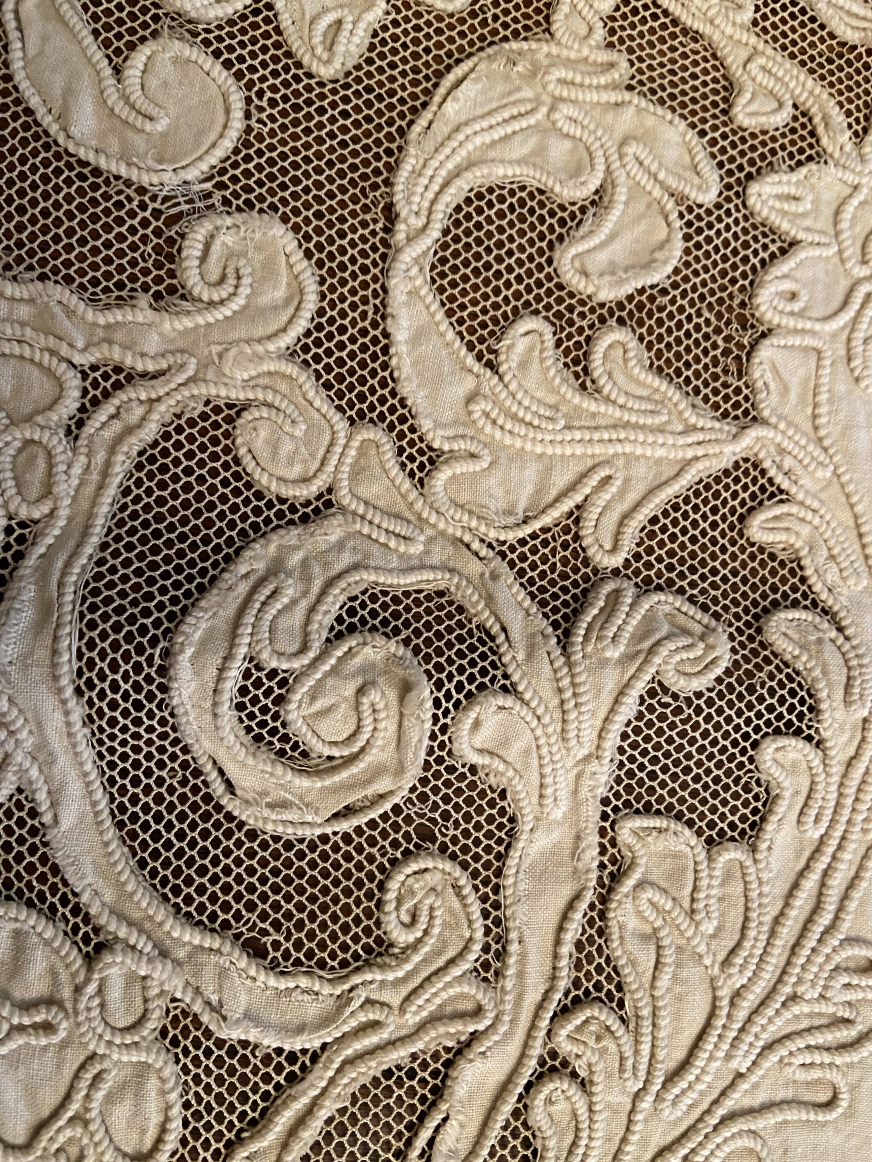 Sheet with embroidered decoration and openwork with cornucopia late nineteenth