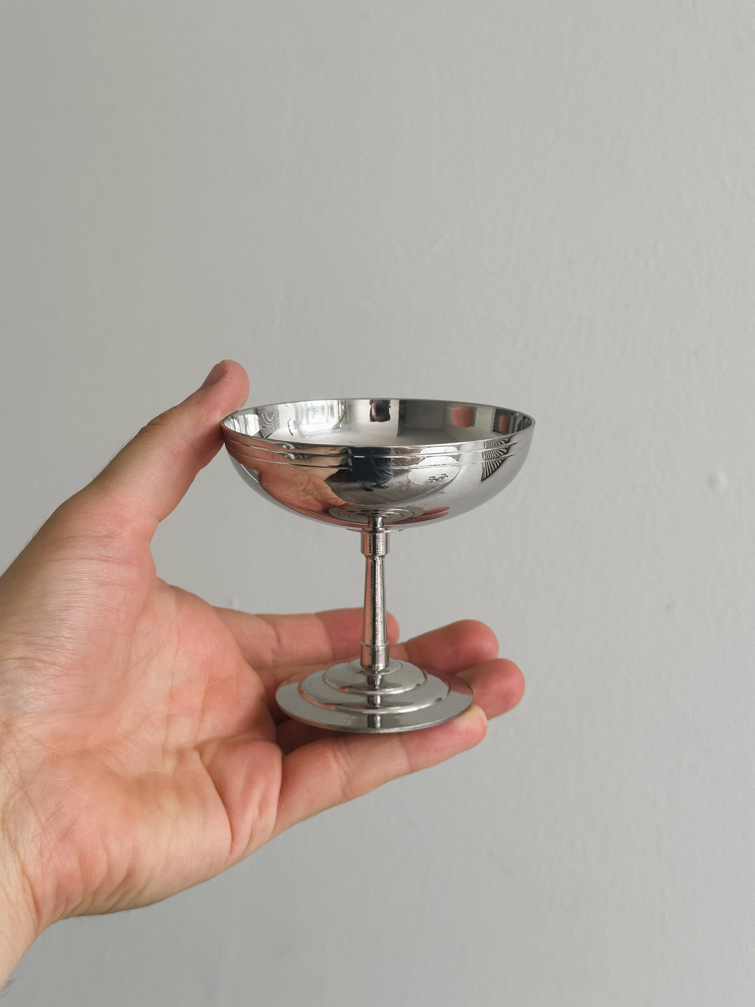 6 Letang Remy shiny stainless steel footed bowls.