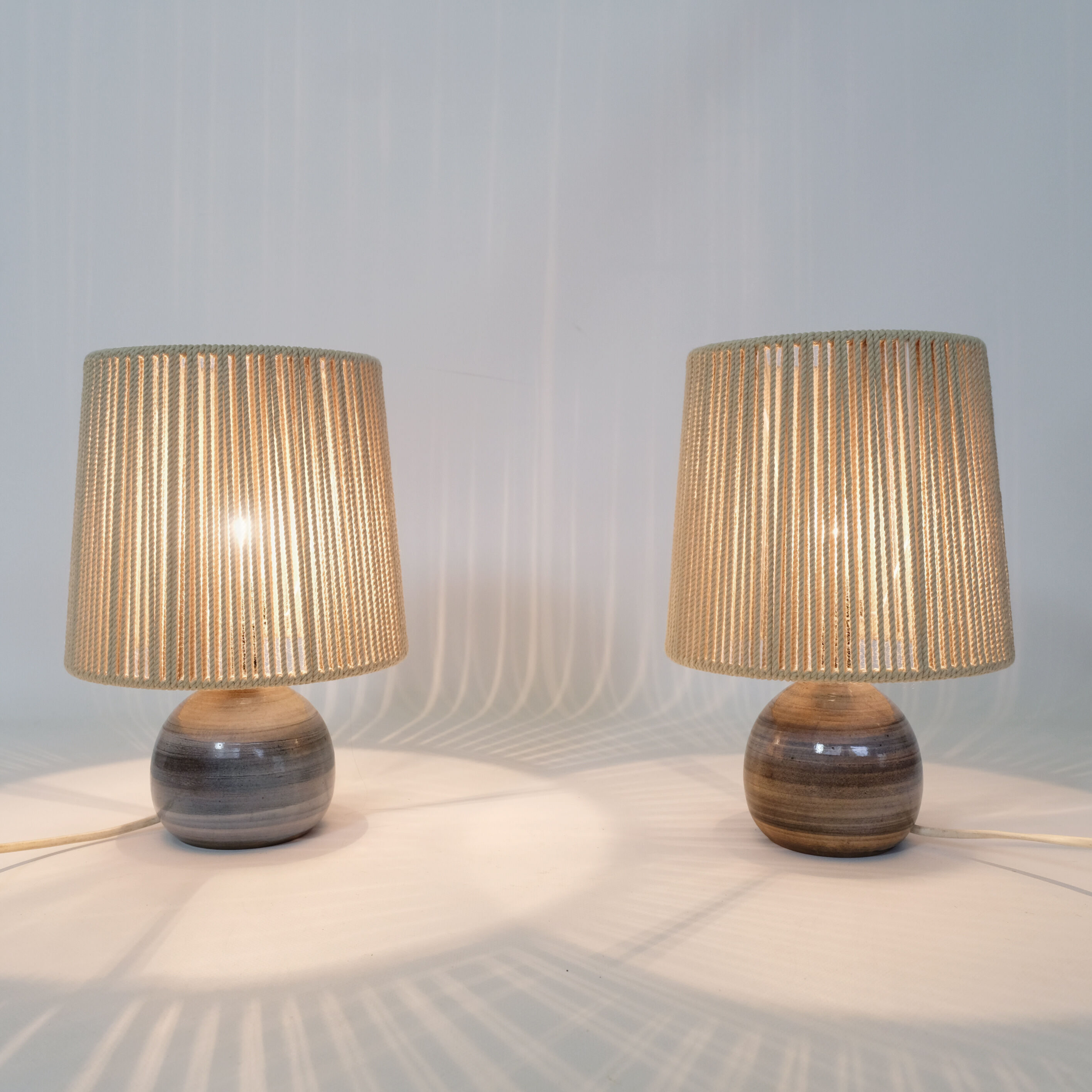 Pair of bedside lamps, rope blinds