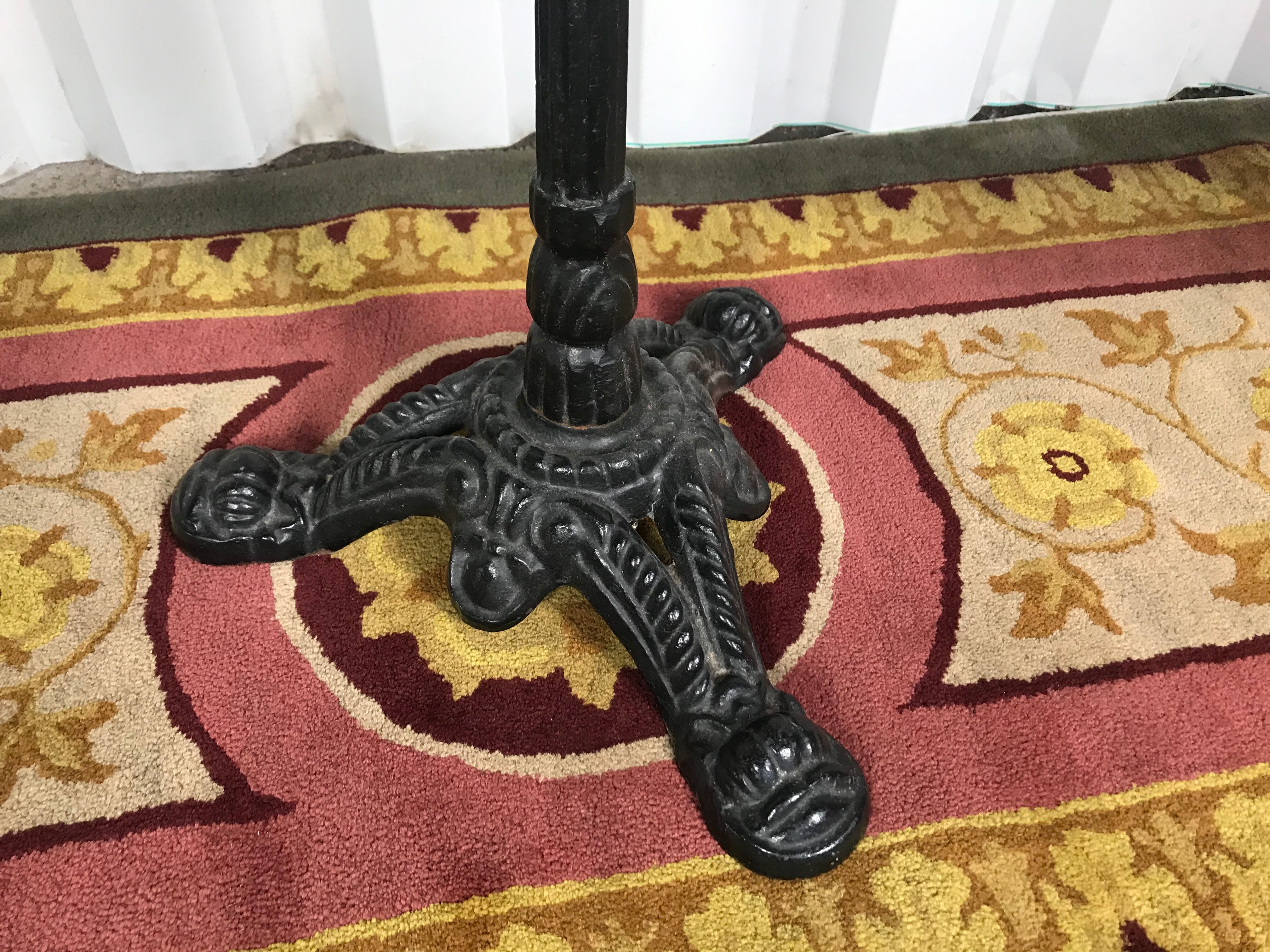 Marble bistro round table and cast foot