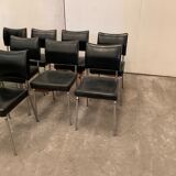 Suite de neuf chaises vintage en chrome et similicuir XX siècle