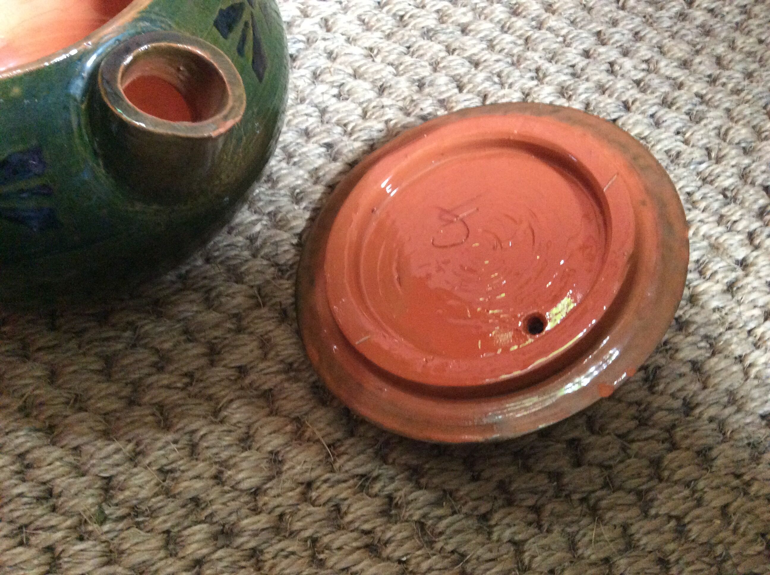 Glazed terracotta teapot