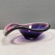 Beautiful dish/bowl in many coloured glass.