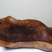 Large monoxyle bowl made of dark raw olive wood from the 1950s.