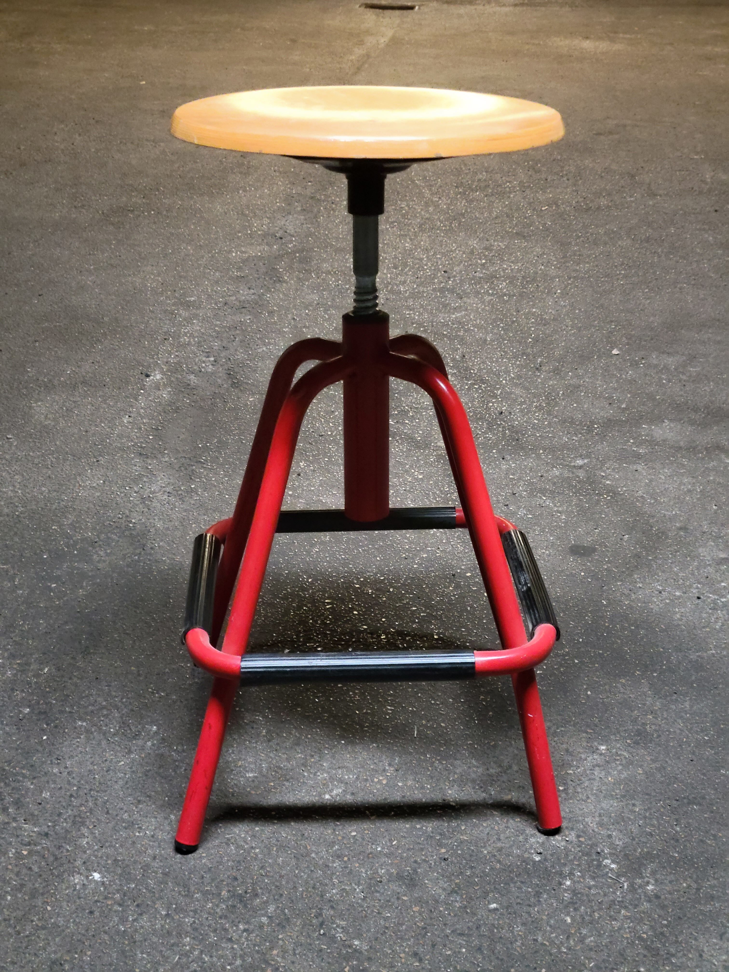 Red stool with industrial vintage screw 80s
